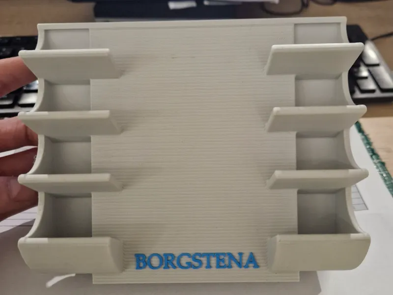 magnetic board marker holder.