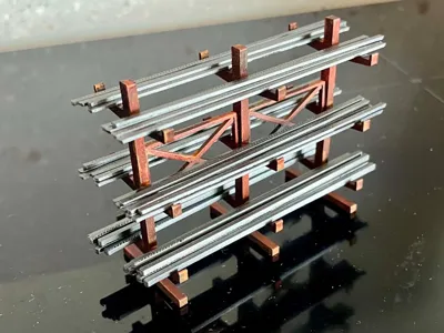 Stand for model railway metal beams