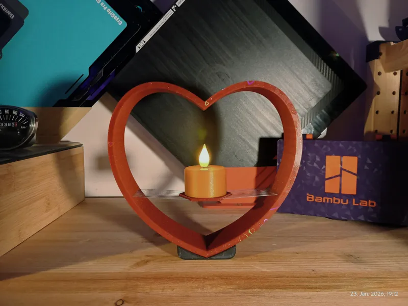 Heart-shaped sliding tea light holder