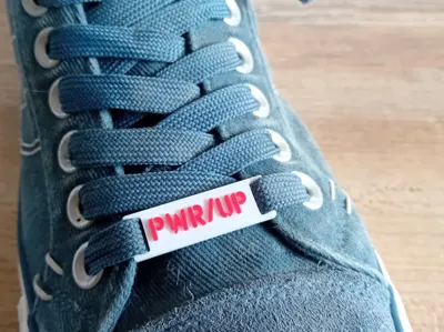 ACDC Pwr/up Tour label for shoelaces