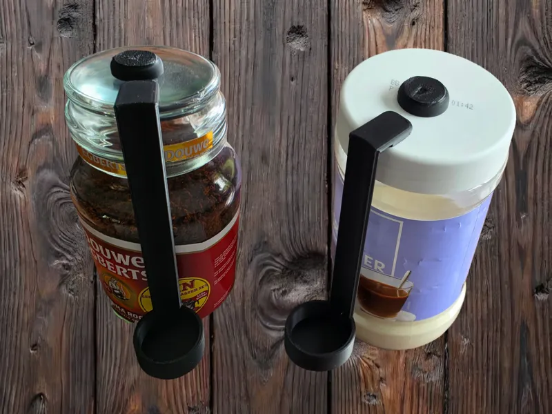 Coffee scoop with a magnetic holder