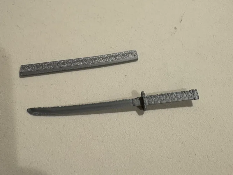 A simply designed mini katana and mini sheath