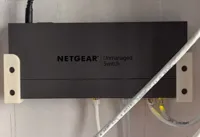 Support mural pour switch Netgear GS108PP — photo 1