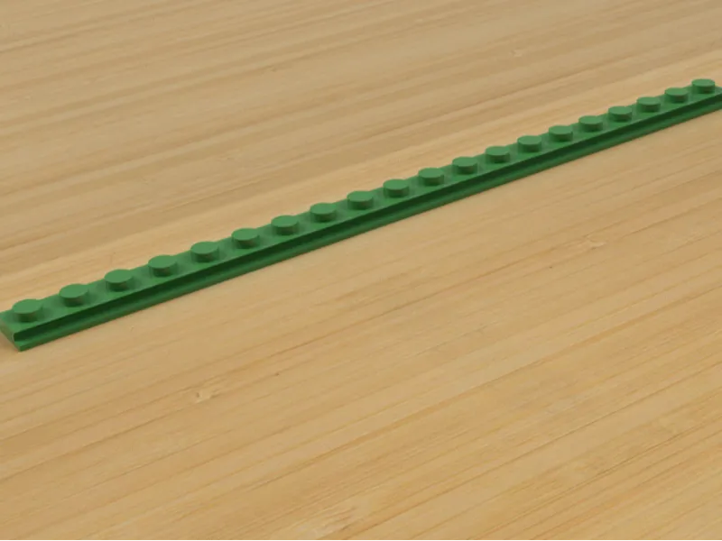 Brick compatible slot cover for 20/20 extrusion
