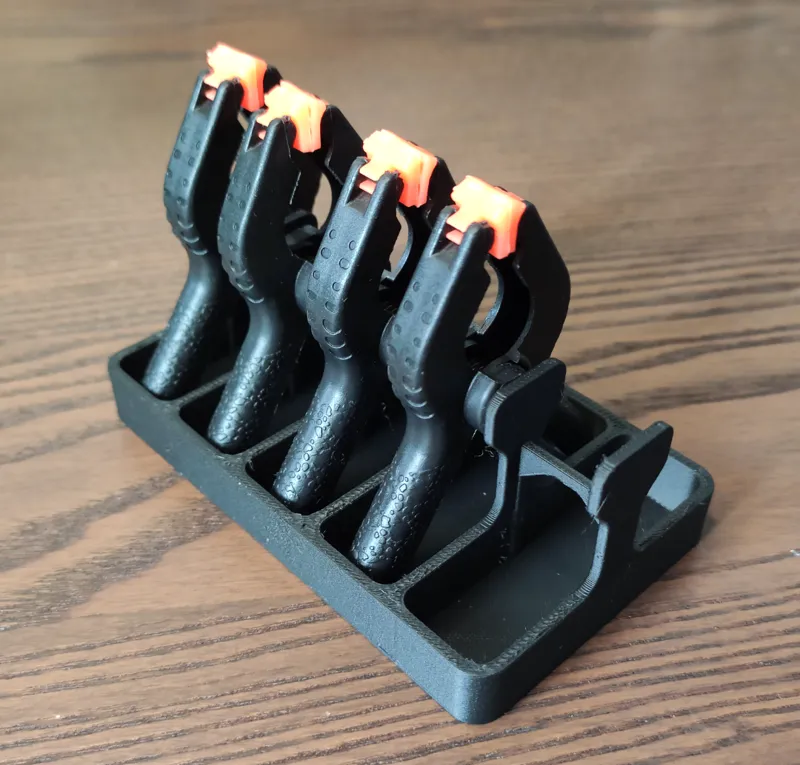 Plastic spring clamps holder
