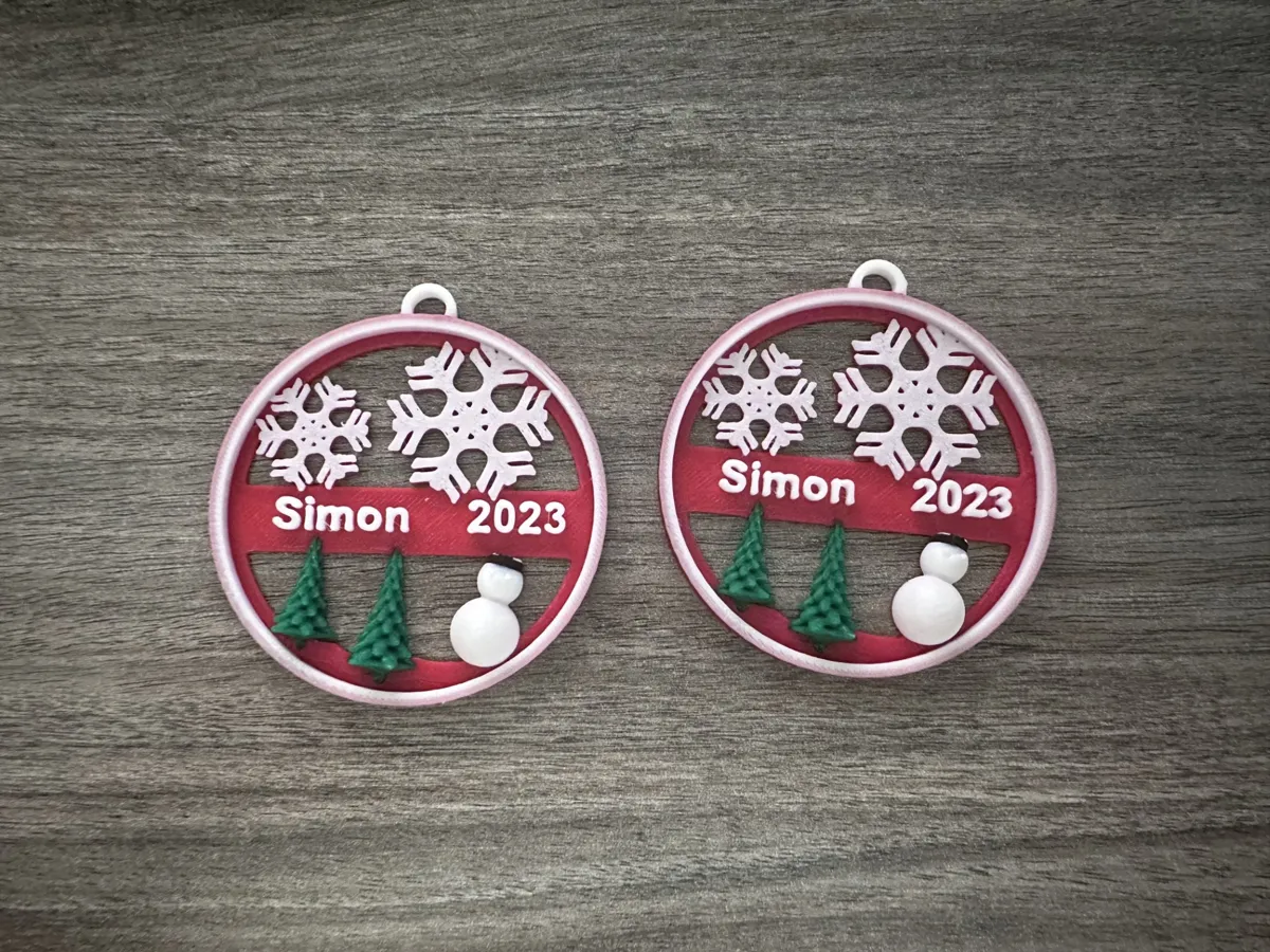 Christmas Ornament with Name and Year Remixed by lisagenix MakerWorld: Download Free 3D Models - 3D model önizlemesi