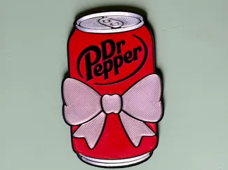 soda can with bow fridge magnet