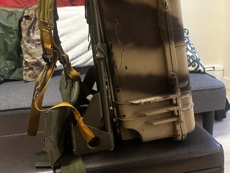 Pelican case mounted on a ruck frame bracket 