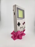 Поставка за Game Boy DMG с дизайн на разтопена дъвка
