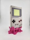 Поставка за Game Boy DMG с дизайн на разтопена дъвка