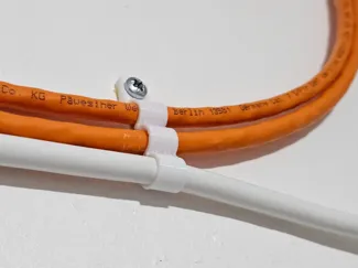 Wall-mounted cable clips with screw hole
