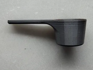 Measuring cup for ground coffee