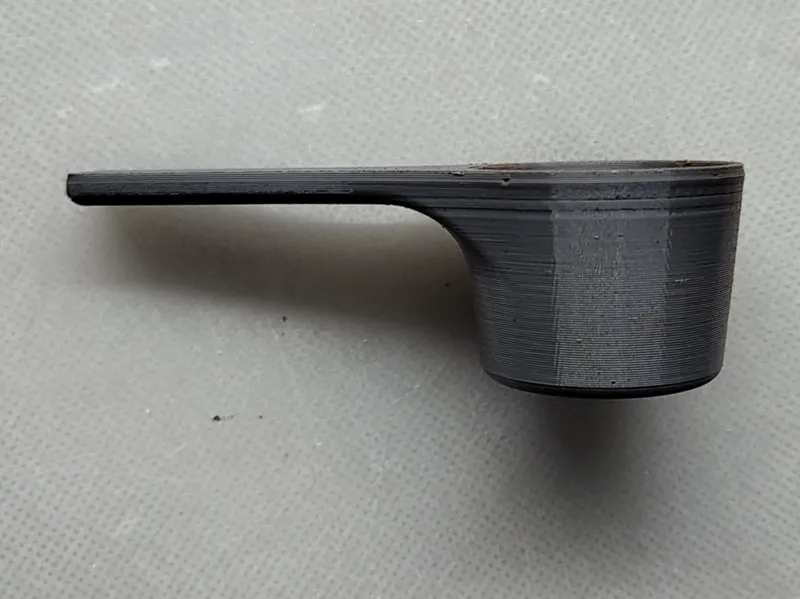 Measuring cup for ground coffee