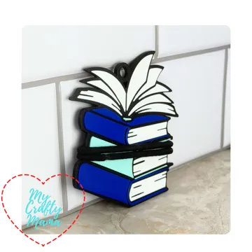 Accesorio para sujetar ligas de cabello: Stack of books hair tie keychain — vista de referencia 3