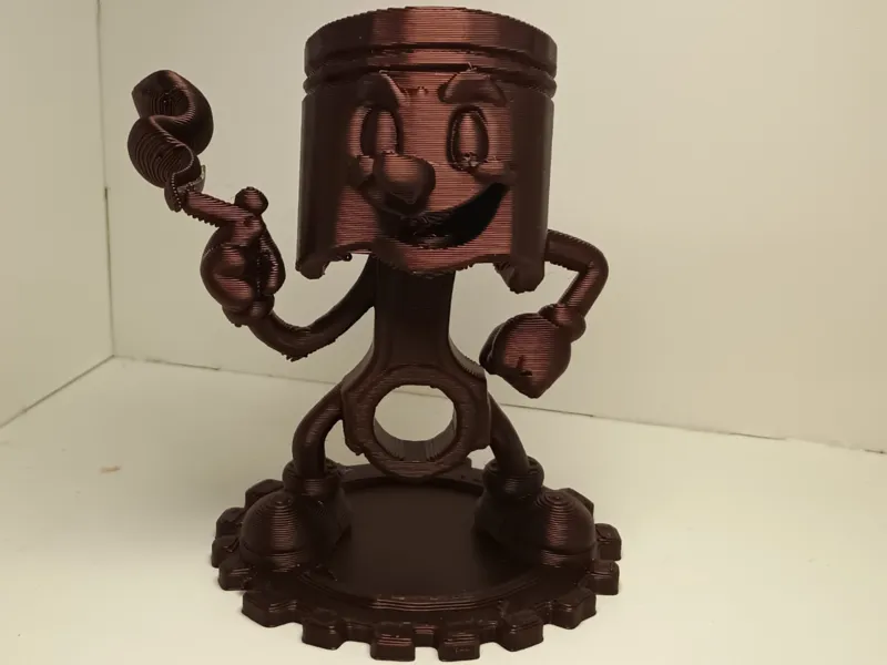 Smokin Piston Figurine