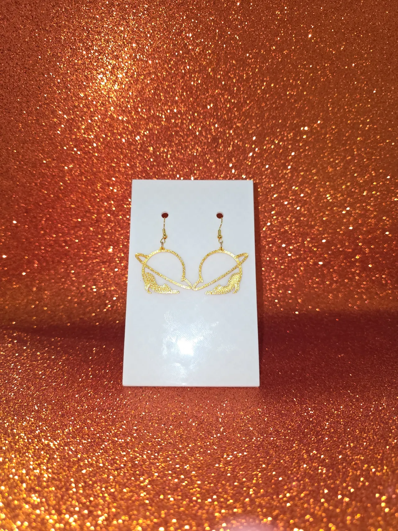Planet cat earrings view 2