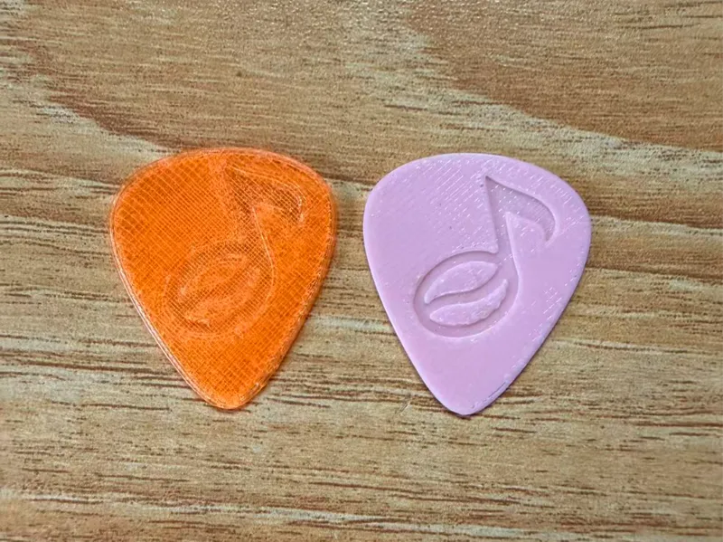 包含咖啡豆和音符的吉他拨片