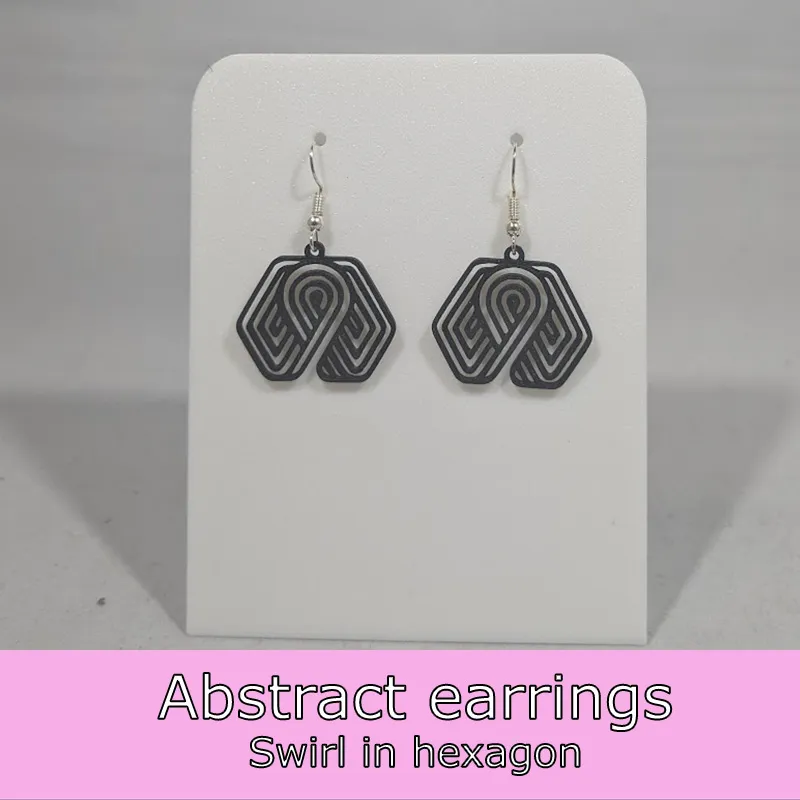 Abstract earrings - swirl in hexagon view 2