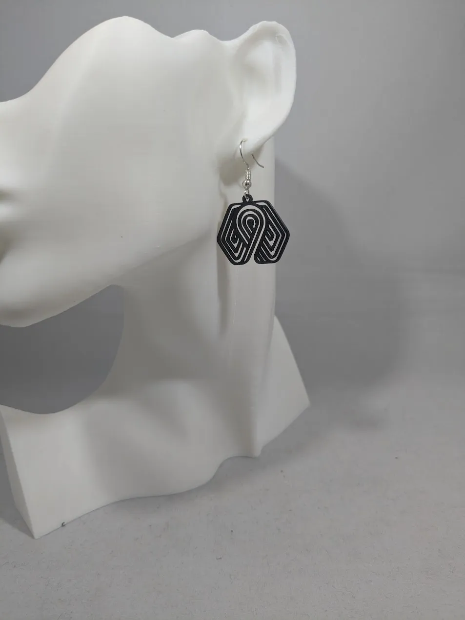 Abstract earrings - swirl in hexagon view 3