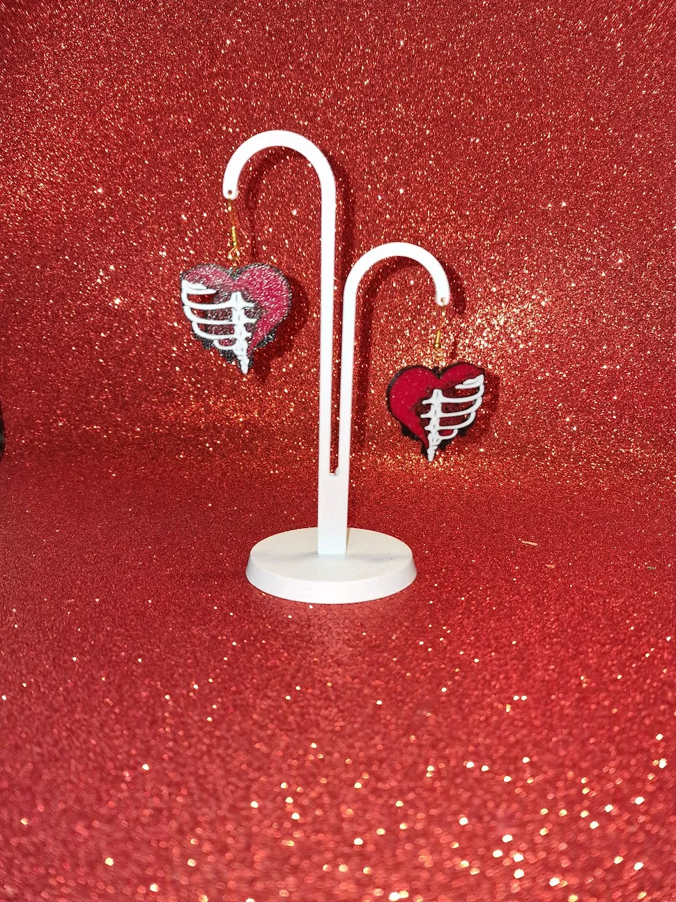 Skeleton heart earrings view 3