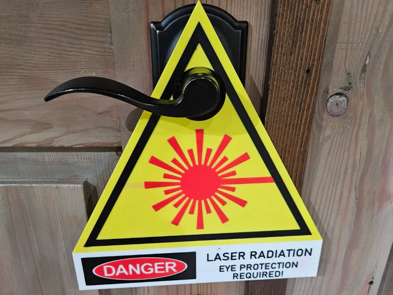 Hangable Laser Radiation Warning Sign, Reversable.