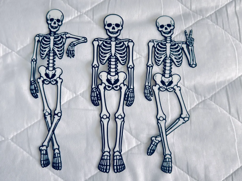 Accesorio de lectura: 3 Skeleton Bookmarks Funny Poses Halloween. Referencia del modelo original.