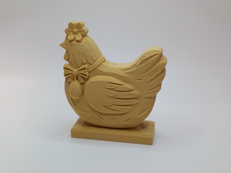 Fruehlingshuhn mit Schleife und Eieranhaenger