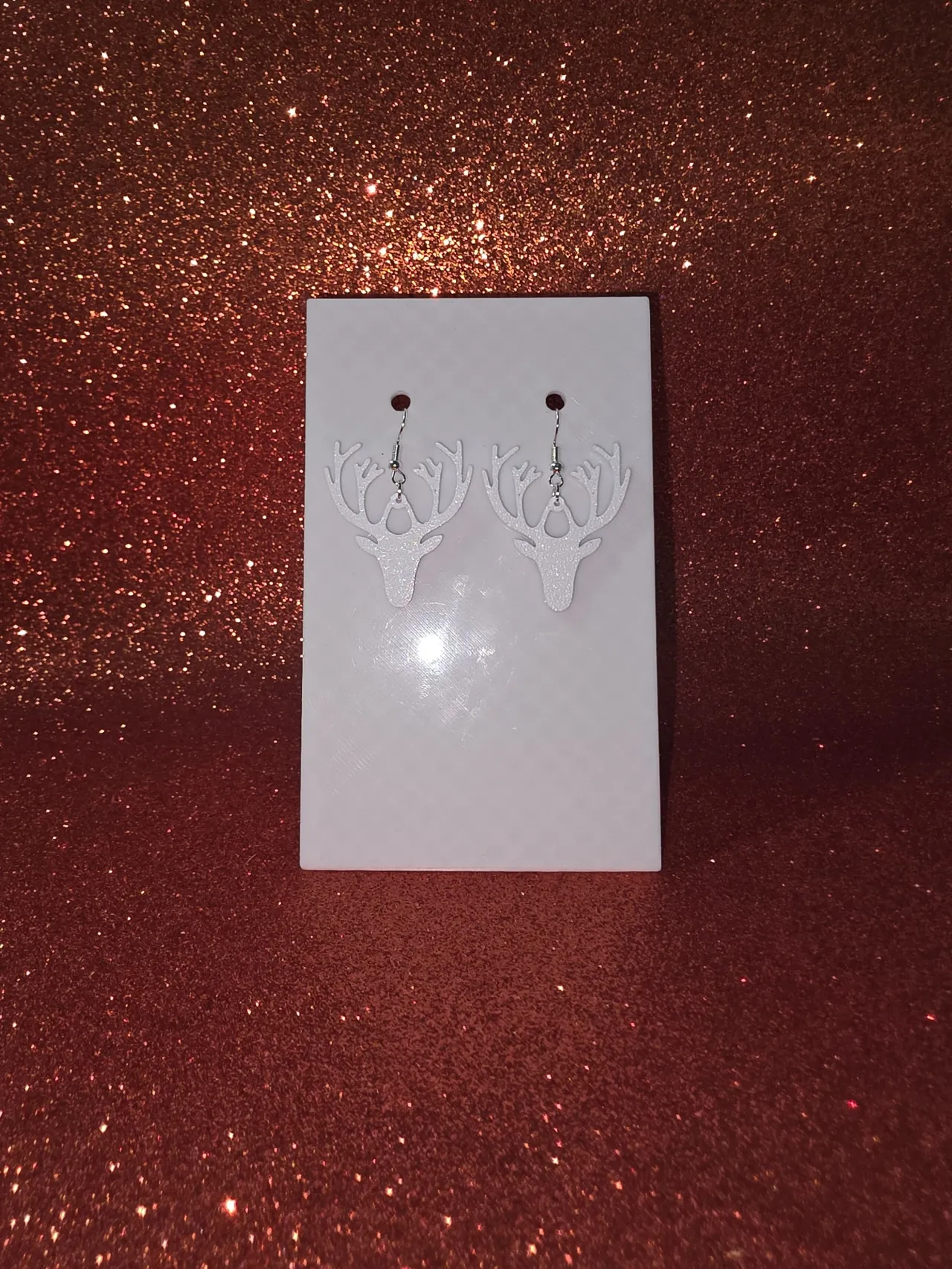 Chief deer earrings view 2