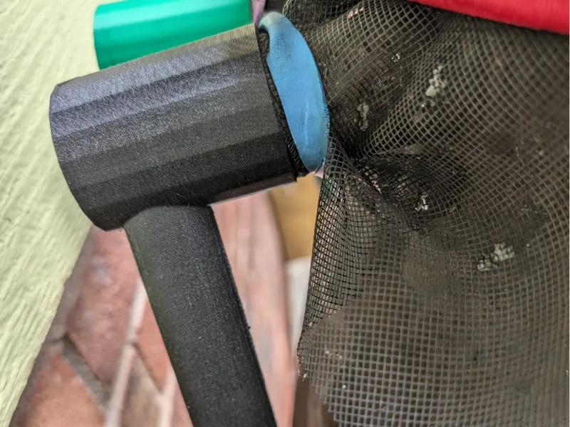 Rain barrel overflow spout