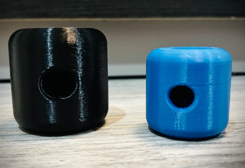 cylinder with a ball inside cat toy