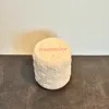 With "Batteries" label on lid