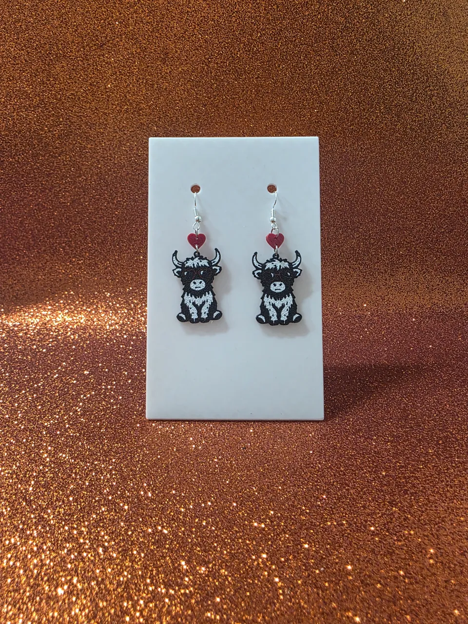 Shady cow earrings view 2