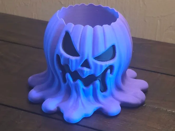 Accesorio de iluminación decorativa: Spooky Melted Face Jack O Lantern Pumpkin. Referencia del modelo original.