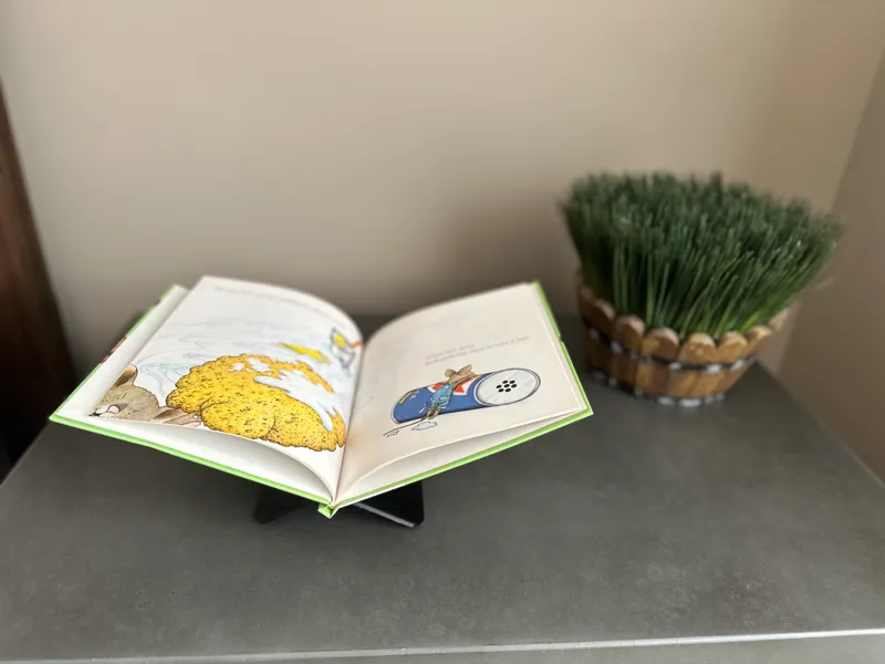 Coffee table book stand