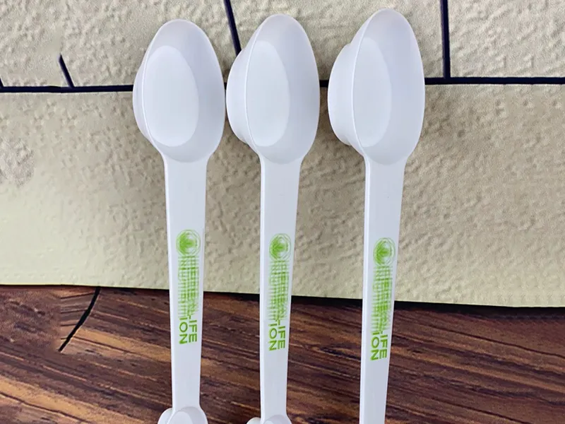 Letrero o emblema decorativo: HerbalLife Measurement Spoon. Referencia del modelo original.
