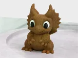 Фигурка динозавър в плетен стил