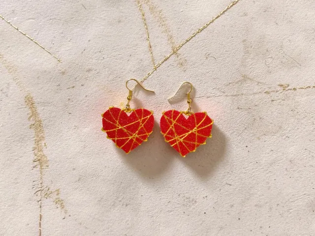 Heart bound earrings