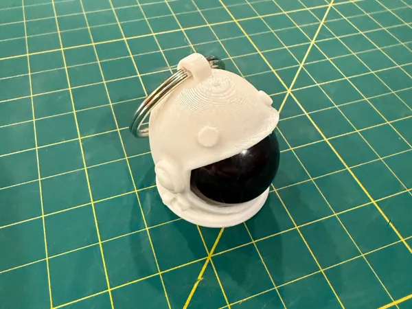 Porte-clés astronaute à bille tournante