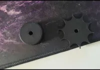 Sprocket and idler for tracks