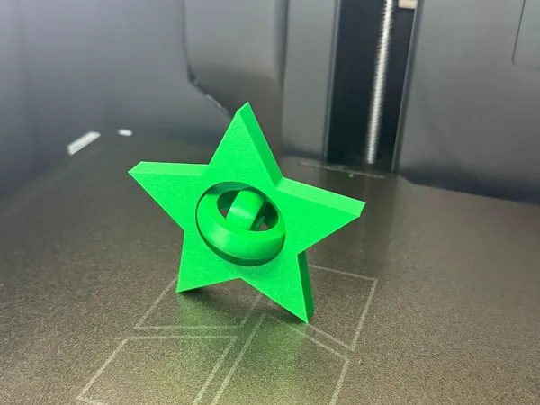 Toupie sensorielle en étoile / fidget spinner