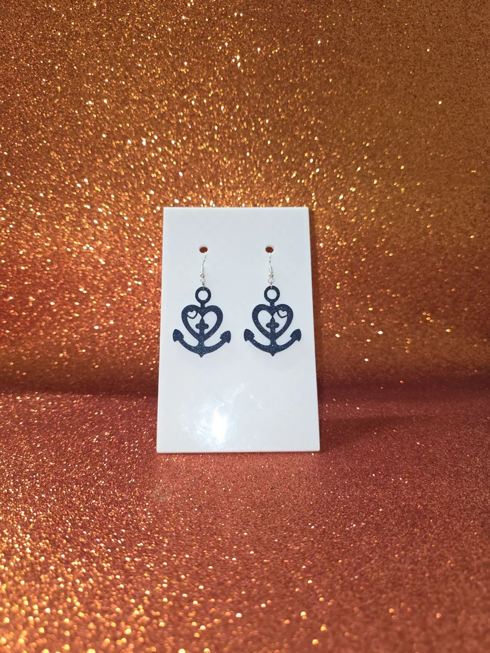 Heart in the heart anchored earrings view 2