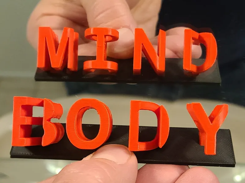 Spiegel-Text "BODY" und "MIND"