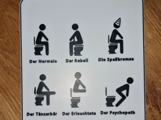 Lustiges Toiletten-Schild