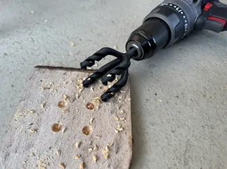 Quad drill bit