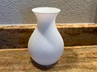 0.12mm layer, 2 walls, 15% infill, vase mode