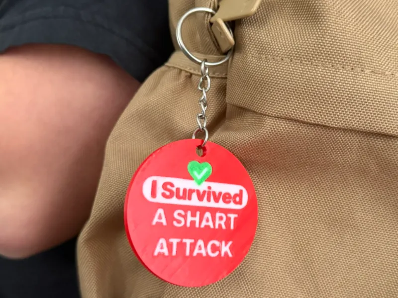 I Survived a shart attack - doublesided keychain