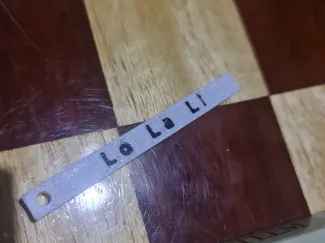 Keychain tag with double sided text