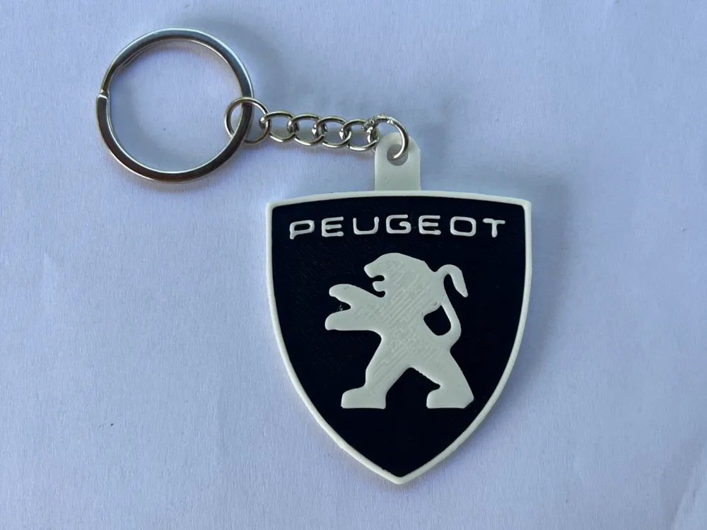 Llavero: Peugeot keychain. Referencia del modelo original.