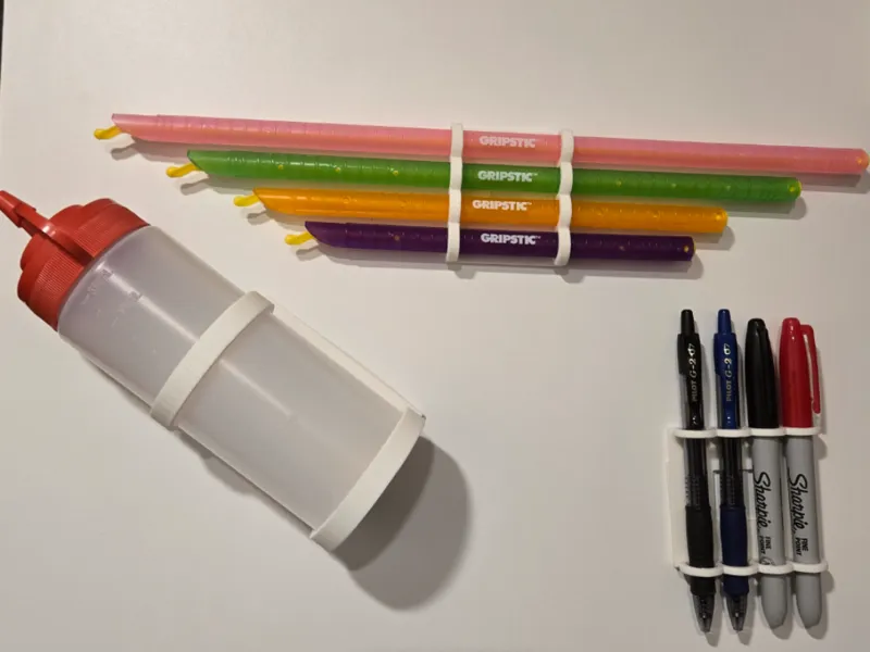 Parametric wall-mount holder for pens, straws