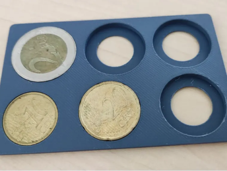 Euro coin holder card with stop